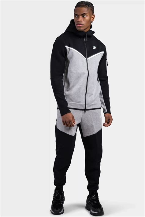 nike trainingspak grijs heren|nike tech trainingspak.